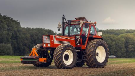 Tractor in Action on a Field wallpaper