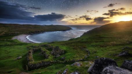 Majestic Coastal Serenity Under a Starry Sky wallpaper
