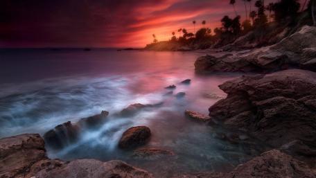 Burning Sunset Over Tranquil Sea wallpaper