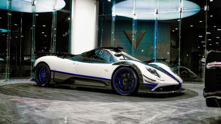 Sleek Pagani Zonda in a Modern Showroom wallpaper