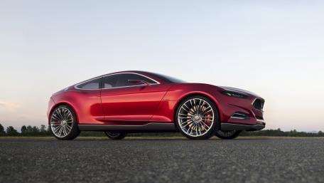 Sleek Red Ford Evos on the Road wallpaper