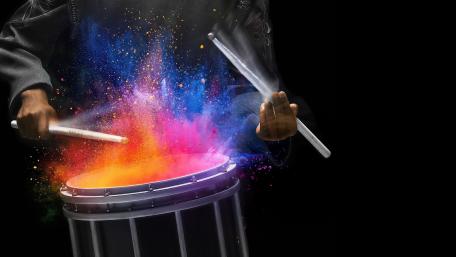 Vibrant Drumming in Colorful Explosions wallpaper