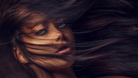 Enchanting Beauty with Flowing Hair wallpaper