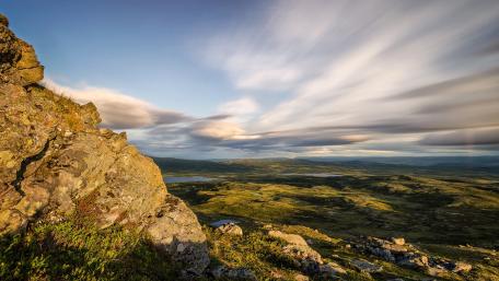 Serene Mountain Landscape Beneath a Colorful Sky wallpaper