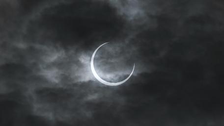 Eclipse through the Clouds in Monochrome wallpaper