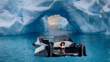 Woman with boat on icy Icelandic ocean wallpaper