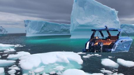 icy Icelandic ocean with a motorboat wallpaper