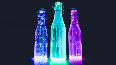 Glowing neon bottles wallpaper