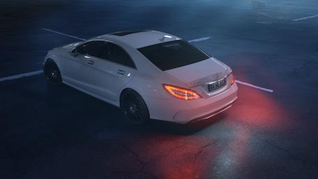 Sleek Mercedes-Benz CLS Under Night Lights wallpaper