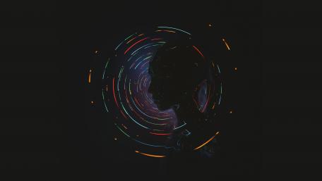 Mystical Silhouette Against Cosmic Swirls wallpaper