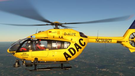 Vibrant Yellow Helicopter in Flight Displaying Aviation Excellence wallpaper