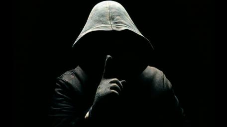 Faceless Enigma in the Shadows wallpaper