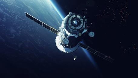 Celestial Majesty of a Satellite in Orbit wallpaper