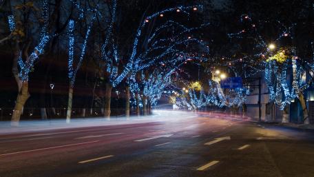 Magical Winter Night Streets with Holiday Lights wallpaper