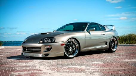 Sleek Silver Supra by the Waterfront wallpaper