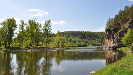 Serene River Landscape in Nature's Embrace wallpaper