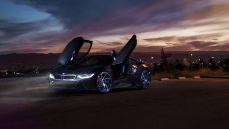 Sleek BMW i8 with Open Scissor Doors at Dusk wallpaper