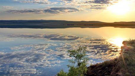 Serene Sunset Over Tranquil Lake Landscape wallpaper
