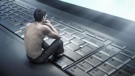 Miniature Thinker on a Giant Keyboard Scene wallpaper