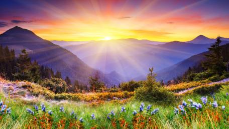 Sunset Radiance Over Majestic Mountains wallpaper