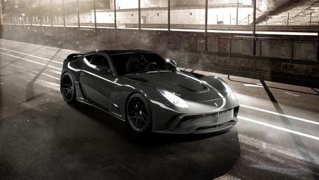 Sleek Ferrari F12 in a High-Octane Setting wallpaper
