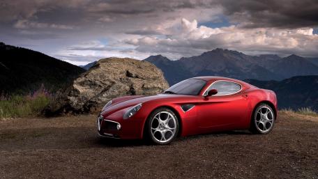 Stunning Alfa Romeo 8C Competizione in Breathtaking Landscape wallpaper