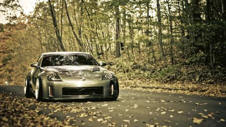 Sleek Nissan 350Z on Serene Autumn Road wallpaper