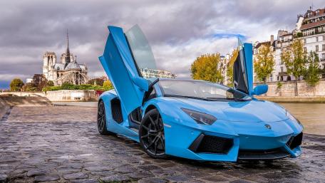 Luxury Lamborghini Aventador on Scenic Cobblestones wallpaper