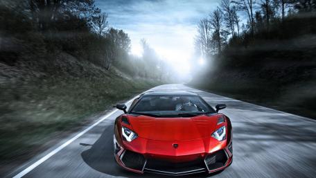 Red Lamborghini Aventador on a Serene Roadway wallpaper