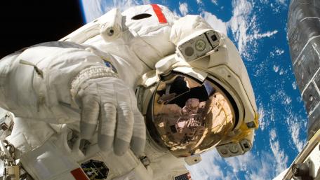 Astronauts Journeying Through the Cosmos wallpaper