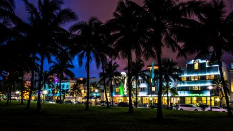Vibrant Nightscape of a Coastal City Scene wallpaper