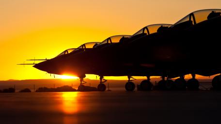 Silhouetted F-35s Against a Stunning Sunset wallpaper