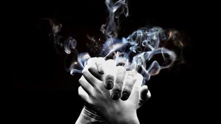 Hands United in Smoke Whispers wallpaper