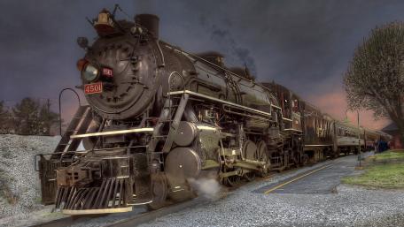 Majestic Steam Locomotive at Station wallpaper
