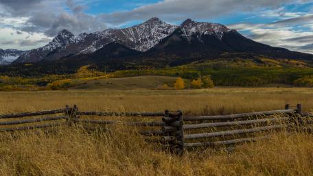 Majestic Mountains Embraced by Autumn Hues wallpaper