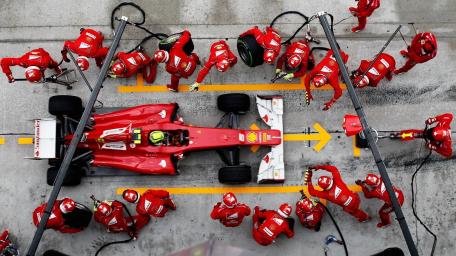 Pit Stop Action of a Formula 1 Team wallpaper