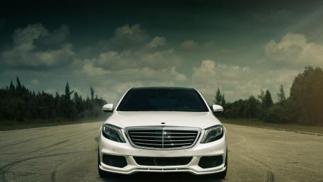 Sleek White Mercedes-Benz on Open Road wallpaper