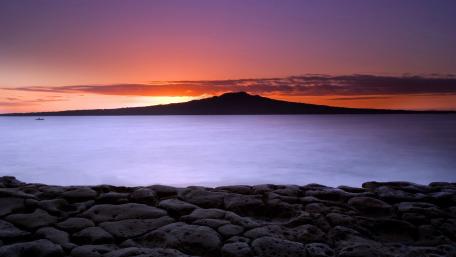Tranquil Sunset Over Serene Shoreline wallpaper