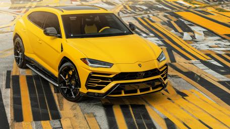 Daring Yellow Lamborghini Urus Wallpaper wallpaper