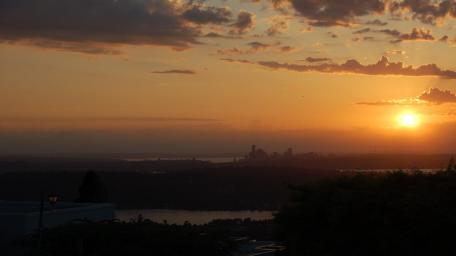 Sunset Over Urban Skyline View wallpaper