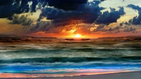 Serene Sunset Over Troubled Waves wallpaper