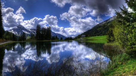 Serene Reflections Over a Tranquil Lake wallpaper