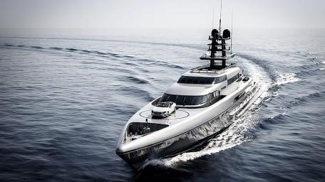 Sleek Luxury Yacht Cutting Through Calm Waters wallpaper