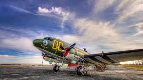 Vintage Military Aircraft Under Breathtaking Sky wallpaper