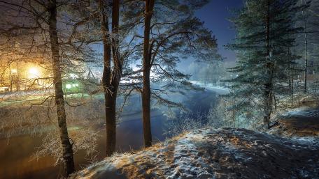 Winter Serenity by a Frozen River wallpaper