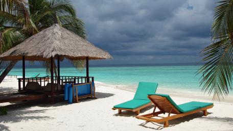Tropical Beach Escape with Palapa and Sunbeds wallpaper