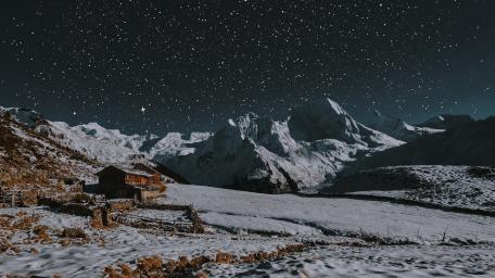 Serene Winter Night Over a Log Cabin Landscape wallpaper