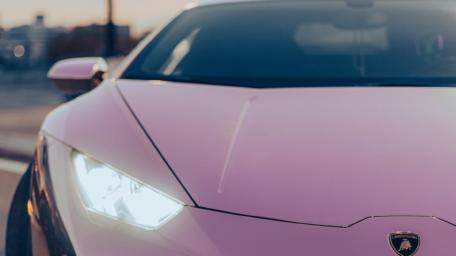 Stylish Pink Lamborghini Close-Up Wallpaper wallpaper
