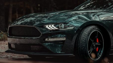 Sleek Sports Car Elegance in the Forest wallpaper