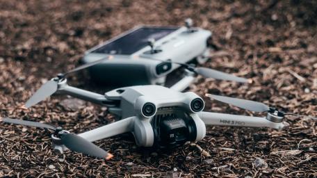 Sleek Drone Cradled in Nature's Embrace wallpaper
